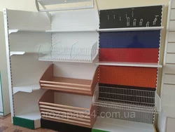 Стеллажи торговые пристенные, островные, навесные, перфорированные, выбор по размерам и цвету Стеллажи торговые пристенные, островные, навесные, перфорированные, выбор по размерам и цвету
